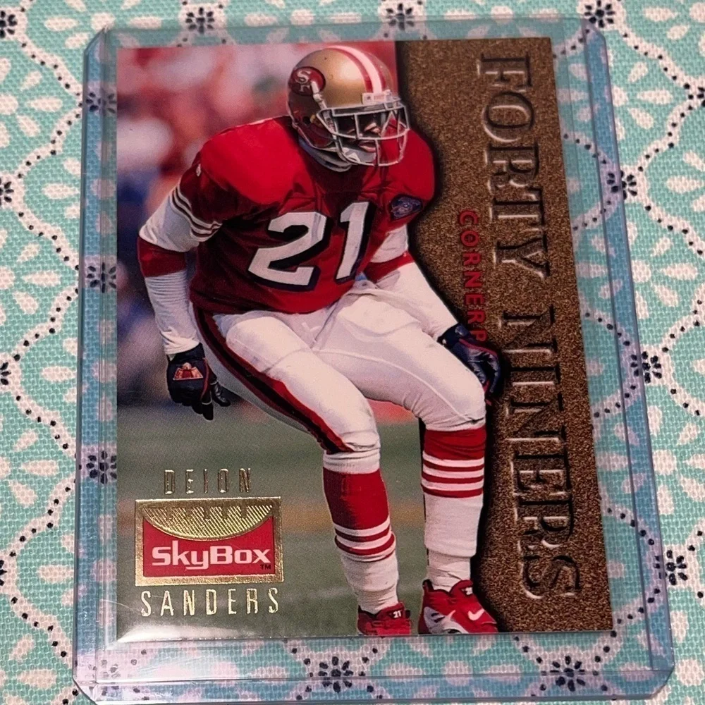 Deion SANDERS 1995 Skybox TRADED Football card #120